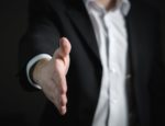 photo of handshake illustrates story about several behavioral health leadership changes including CEO at Bradford health Services